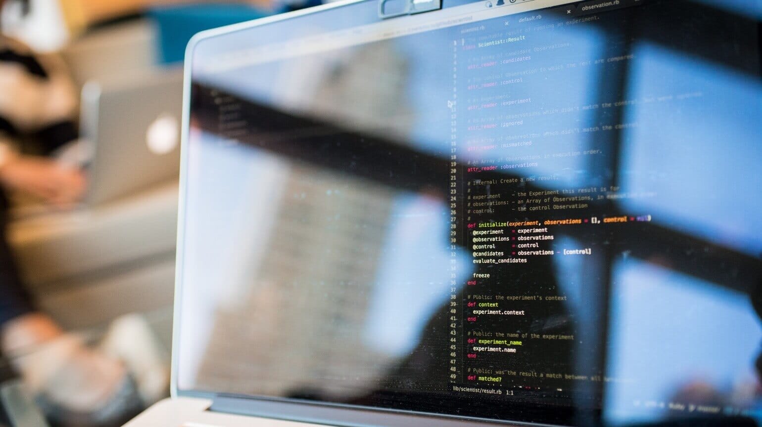 Close up of a laptop screen with code